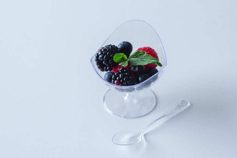 Clear Scallop Stem Cup on white background 