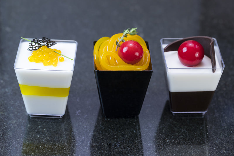 Square Dessert Cup with dessert on black background 